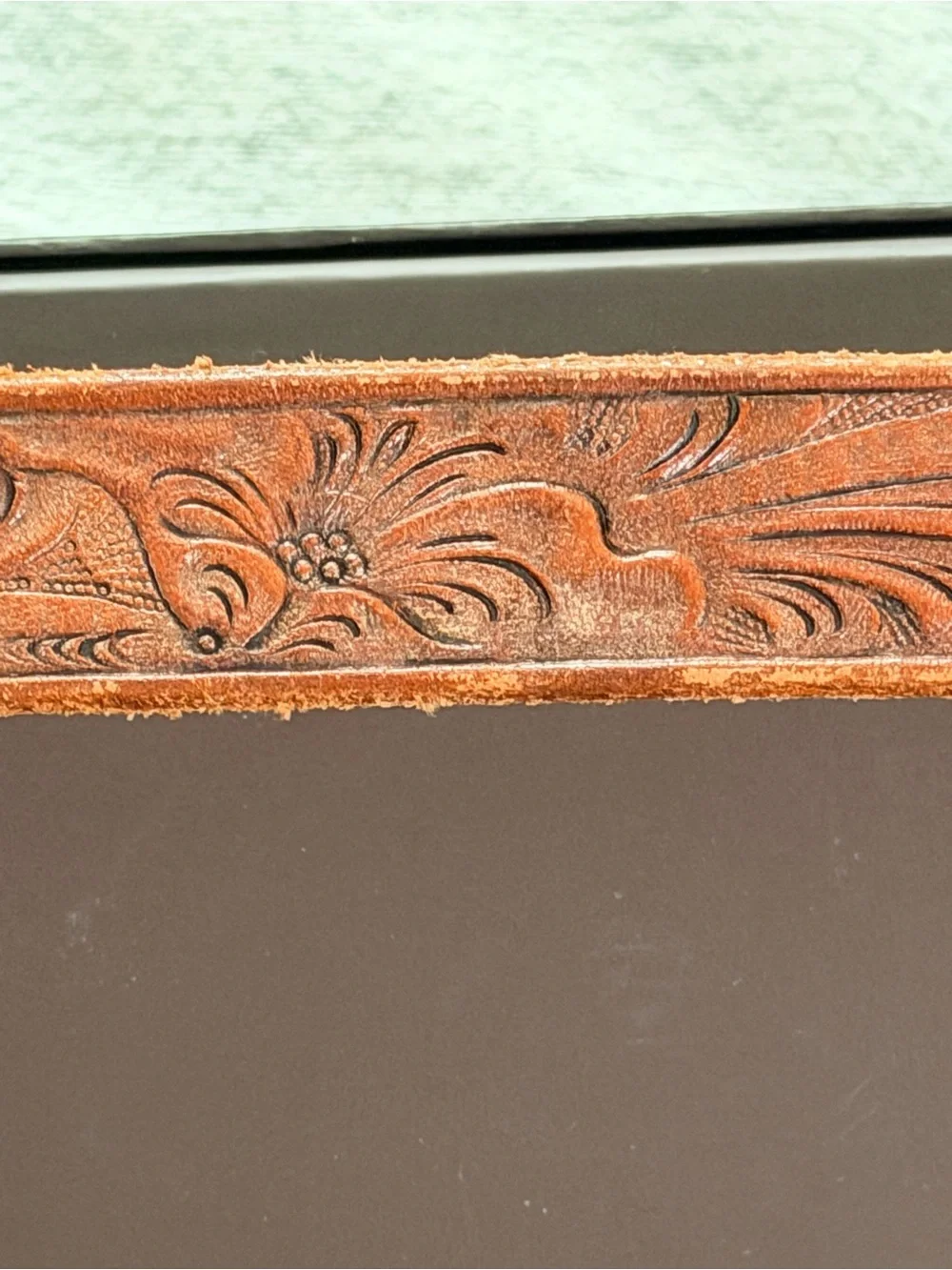 Vintage Western tooled leather belt with a three-piece engraved silver-tone 26